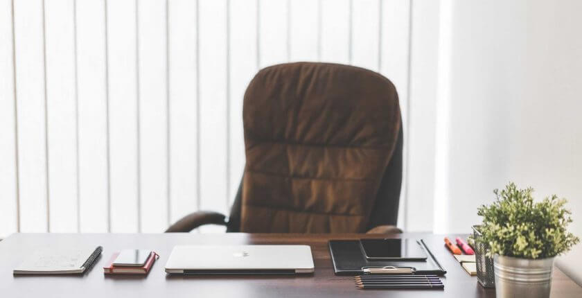 Picture of an empty seat at an office desk